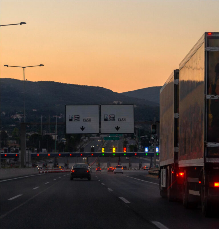 The positioned toll scale accurately weighs the load for potential refunds.